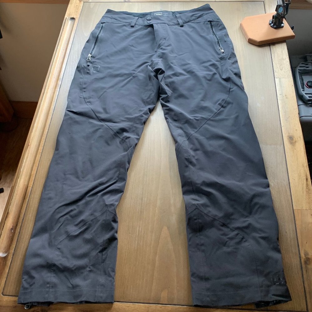 REI women's Elements rain and hiking pants.